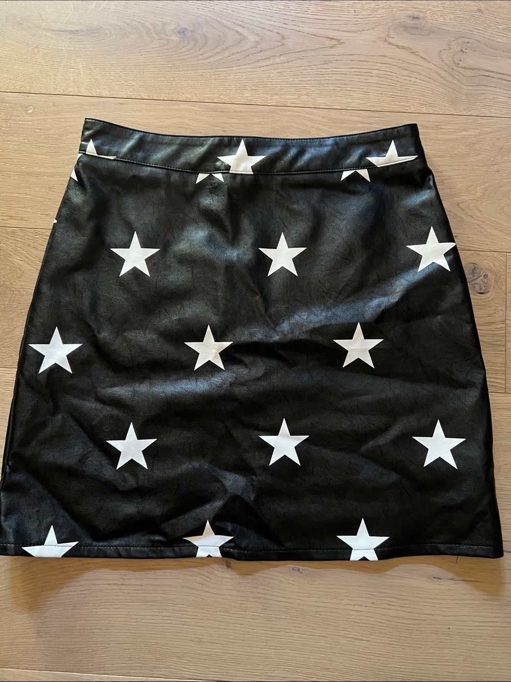 Nasty Gal Black Faux Leather Mini Skirt with White Star Print